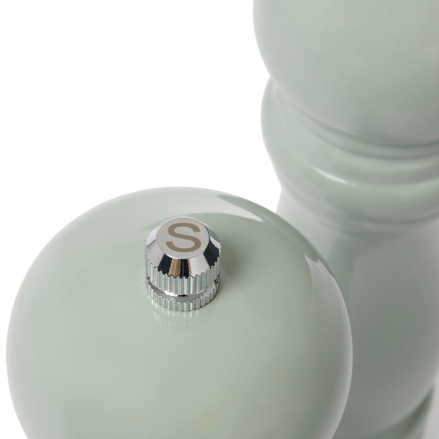Green salt and pepper mills by Sophie Allport top lettering