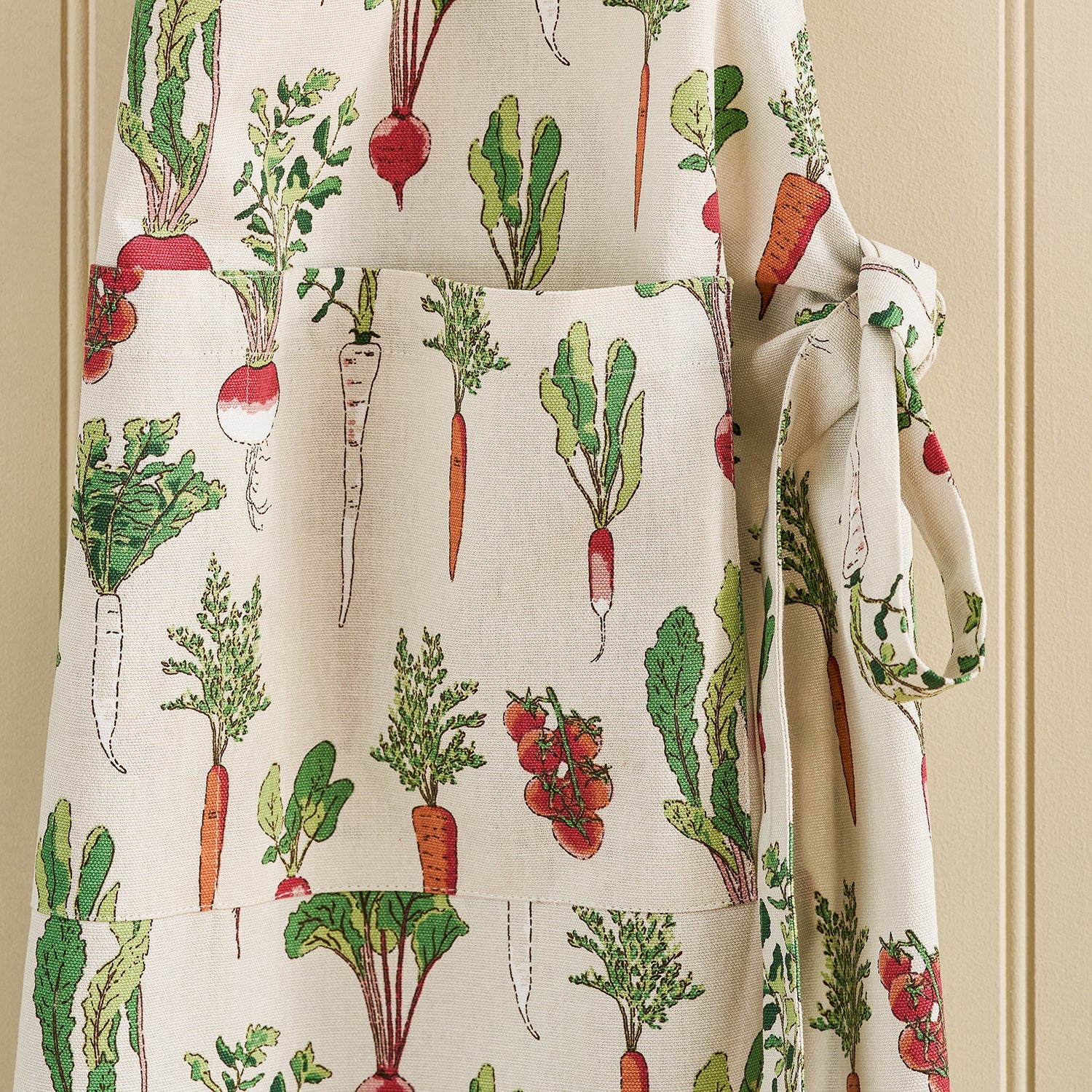 Garden vegetables printed adult apron by Sophie Allport detail