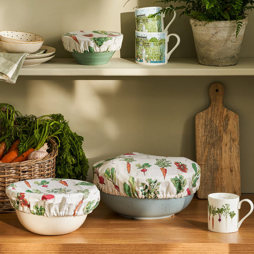 Fabric food covers with garden vegetables print by Sophie Allport