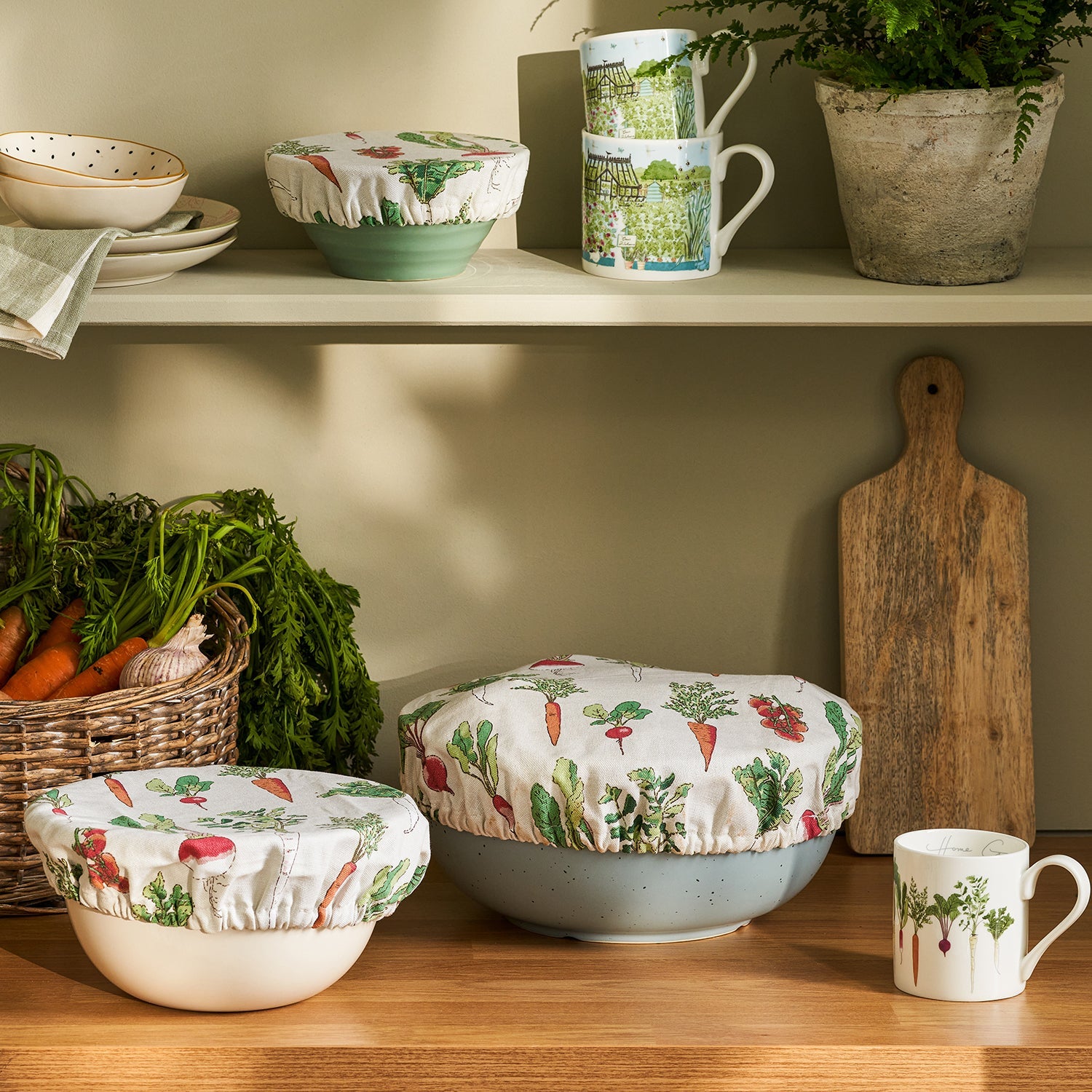 Fabric food covers with garden vegetables print by Sophie Allport