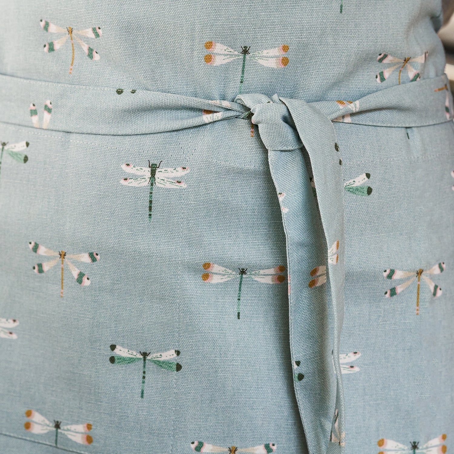 Blue dragonfly printed adult apron by Sophie Allport tie detail