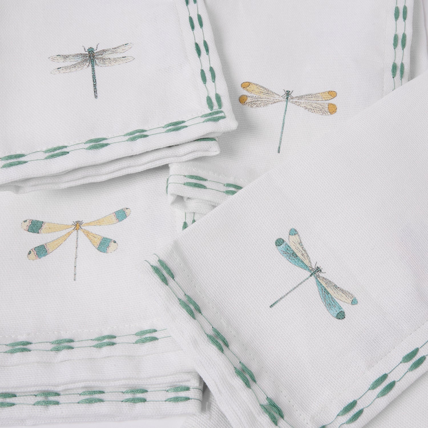 White embroidered napkins with dragonfly print by Sophie Allport corner detail