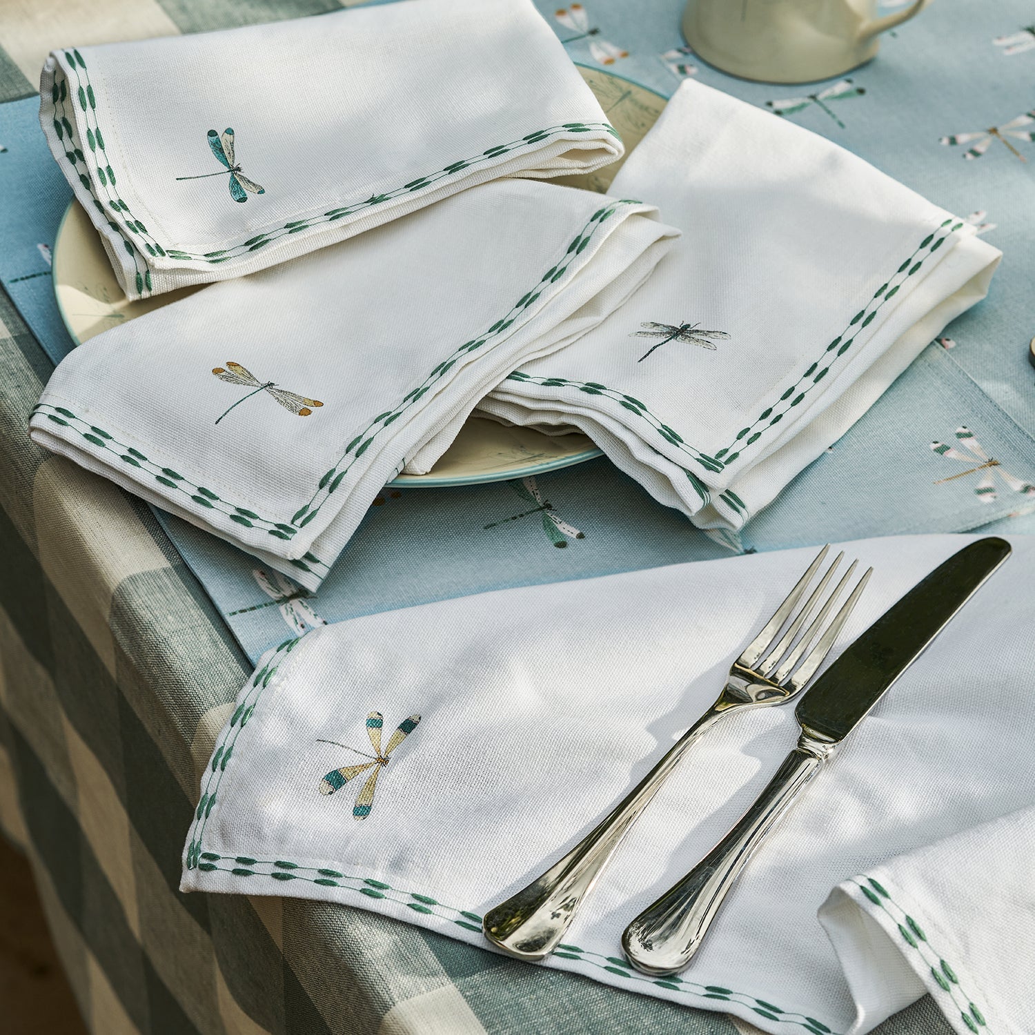 White embroidered napkins with dragonfly print by Sophie Allport