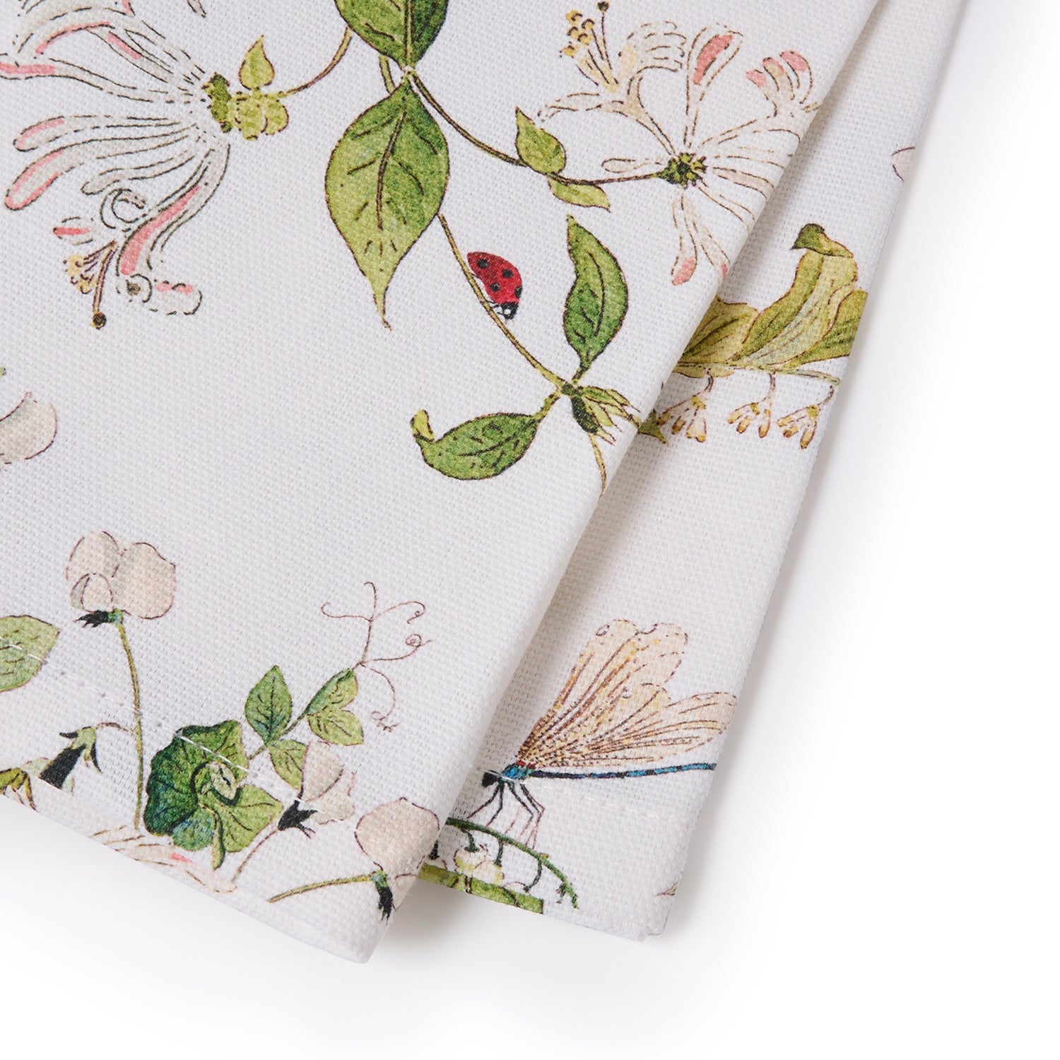 White napkins with floral print by Sophie Allport corner detail