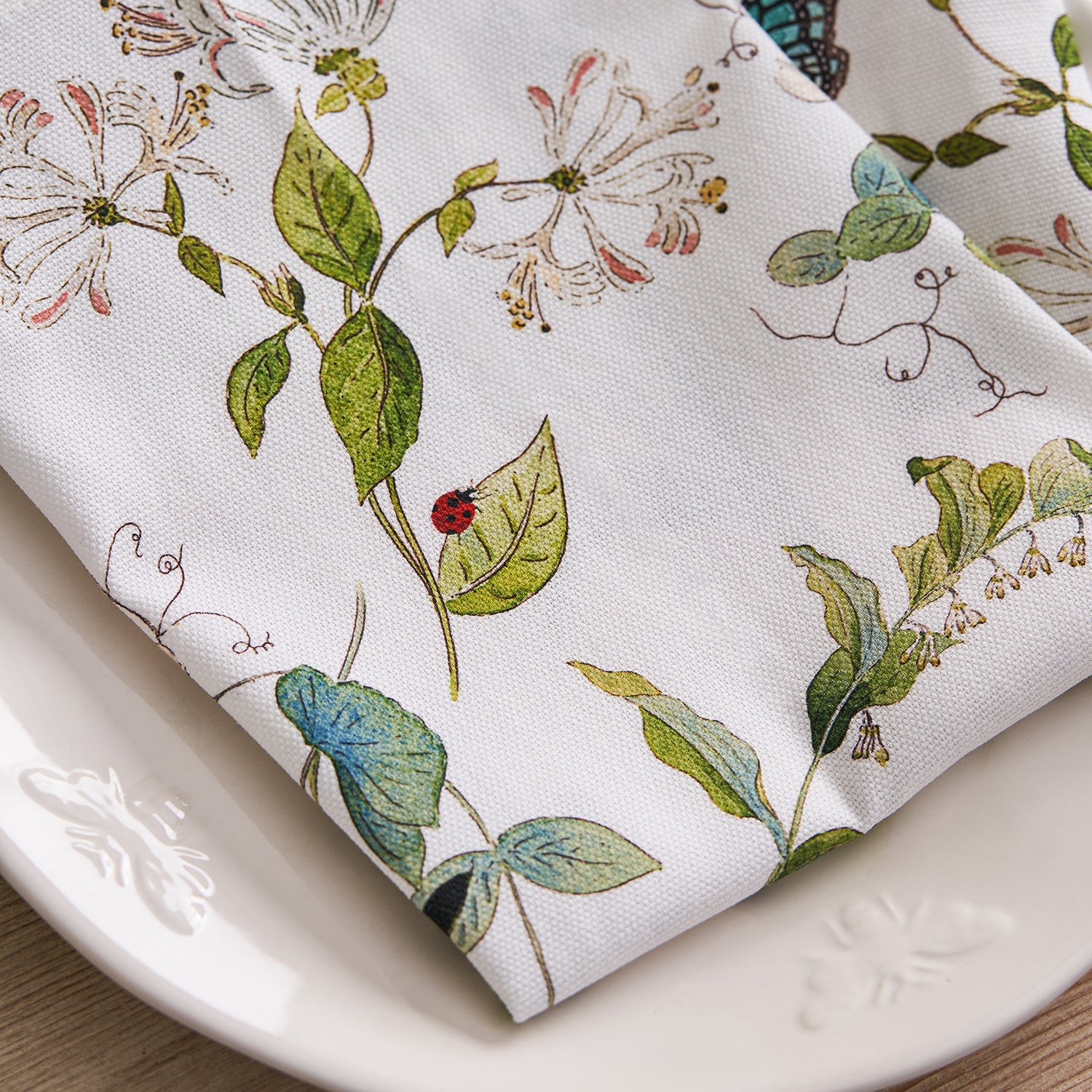 White napkins with floral print by Sophie Allport detail