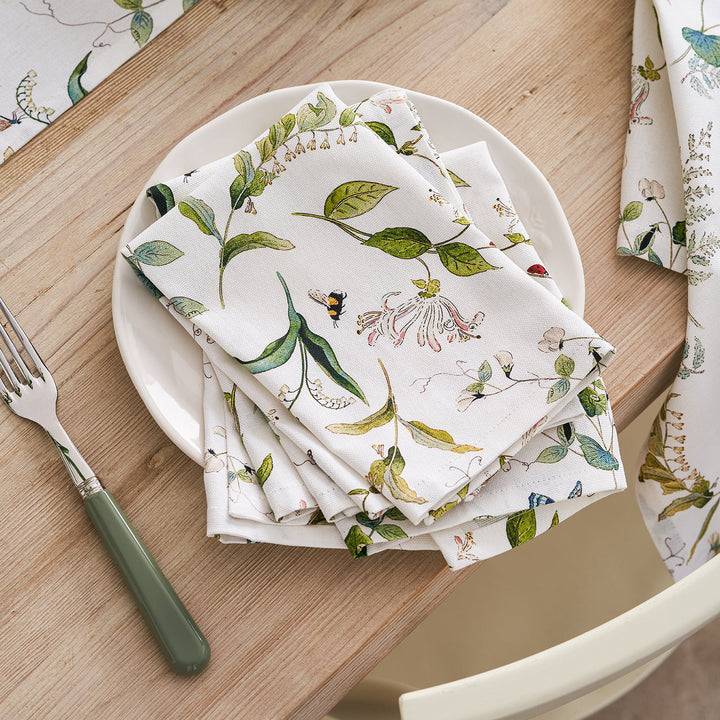 White napkins with floral print by Sophie Allport