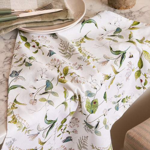 White tea towel with floral print by Sophie Allport
