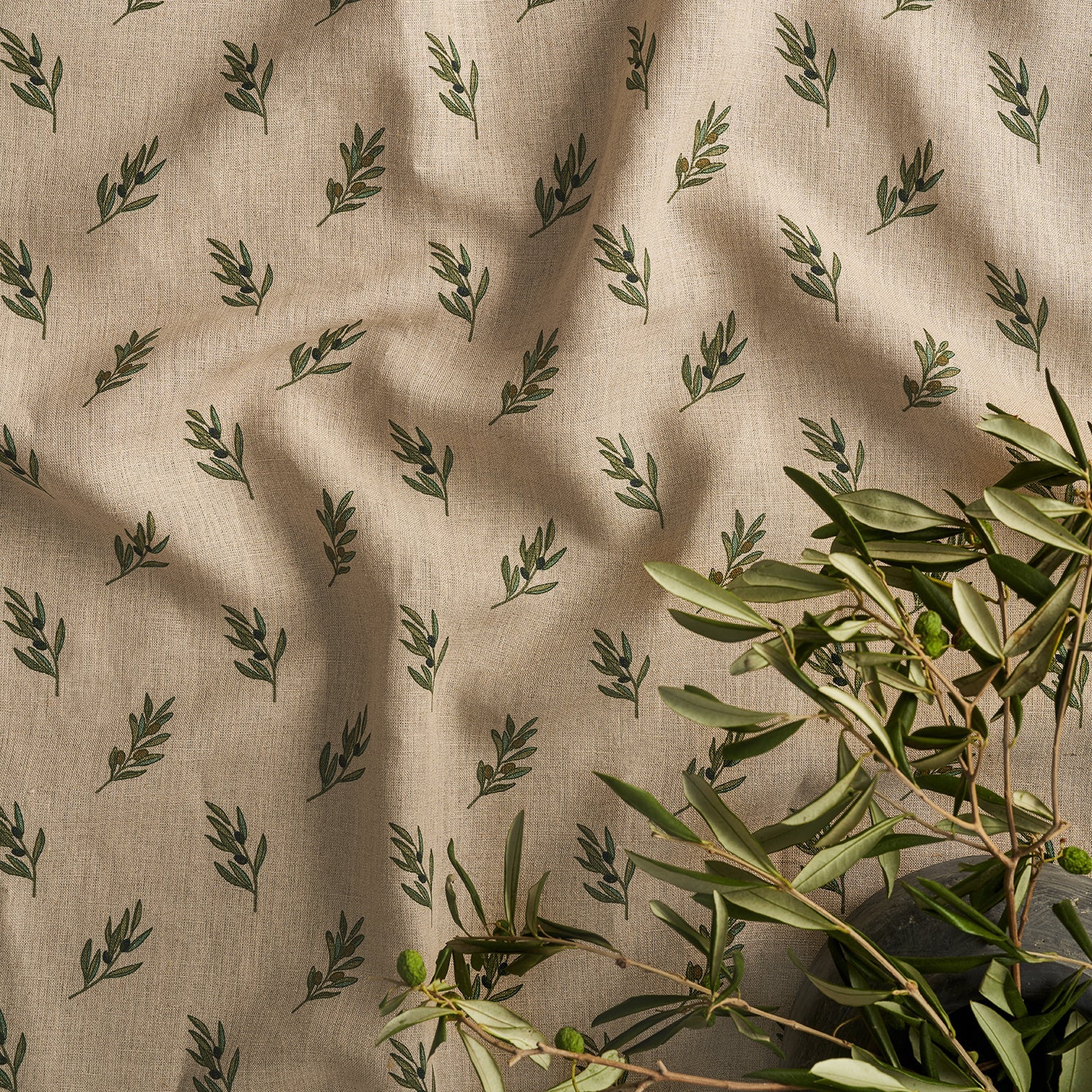 Olive printed linen fabric by Sophie Allport