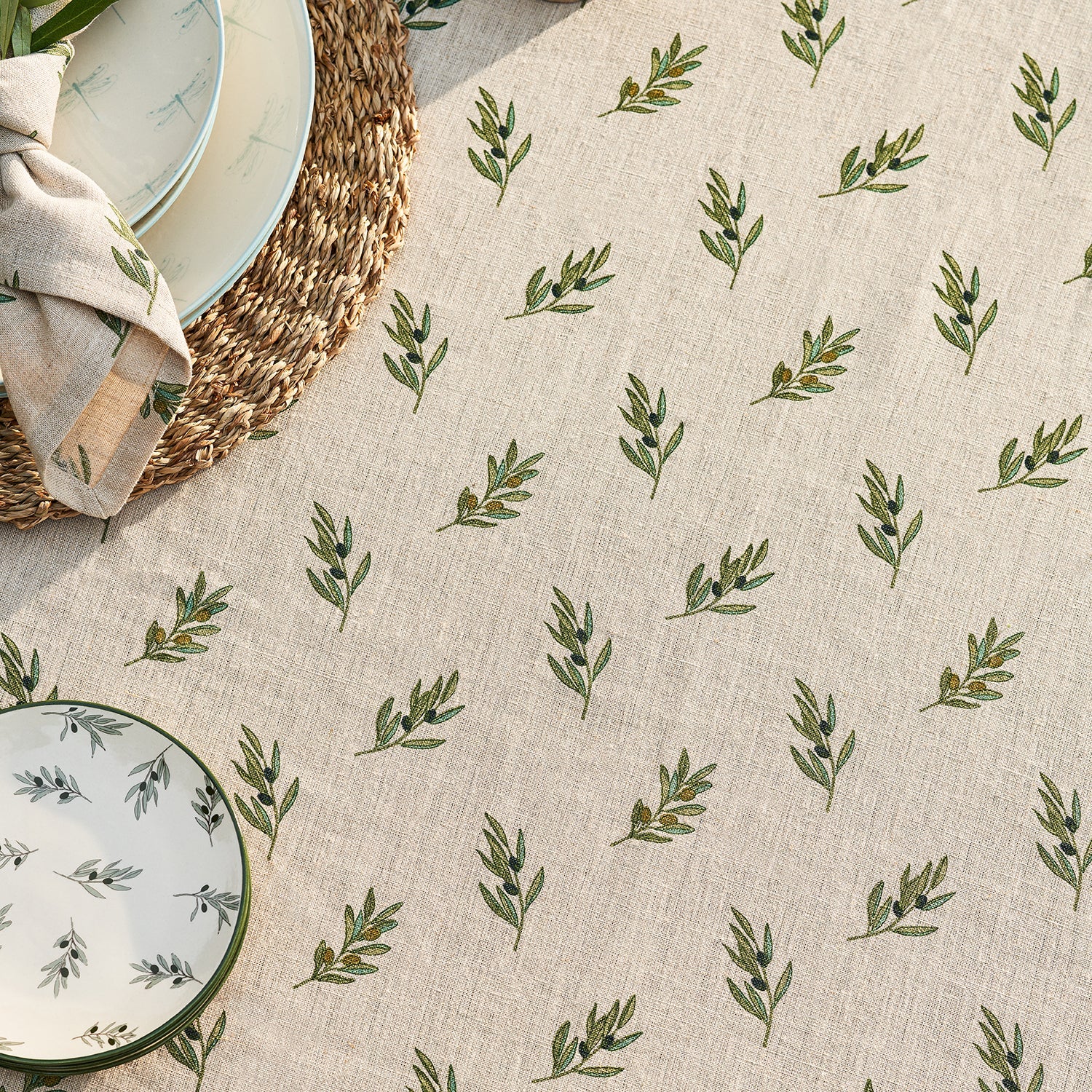 Neutral linen tablecloth with olive print by Sophie Allport detail