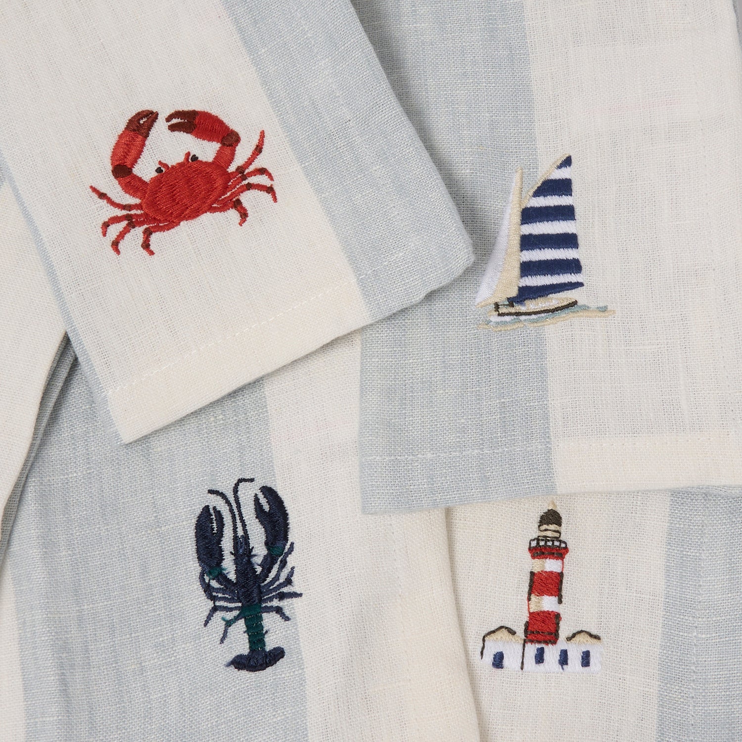 Blue stripe linen napkins with coastal prints by Sophie Allport embroidery detail