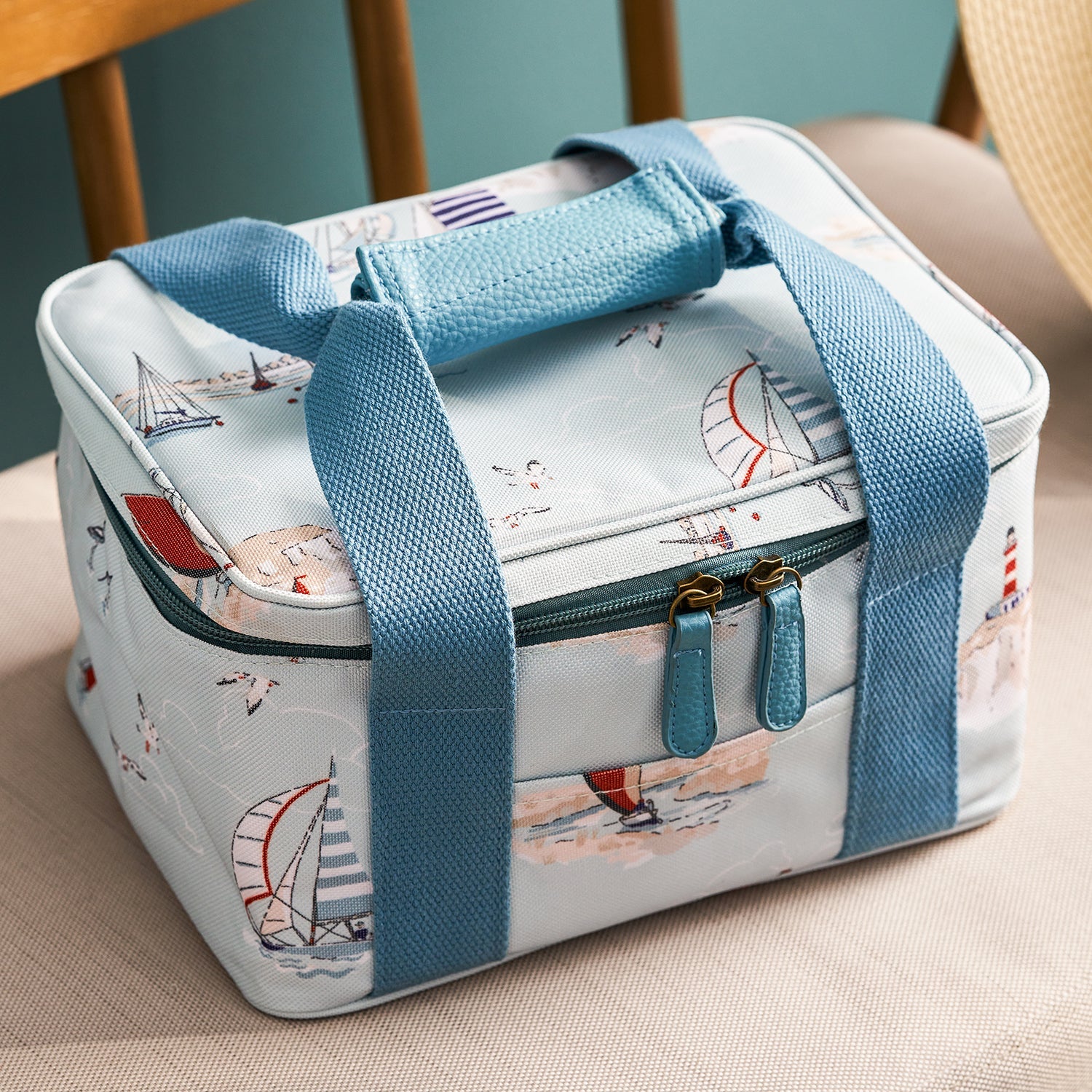 Blue lunch bag with coastal sailing boats print by Sophie Allport detail