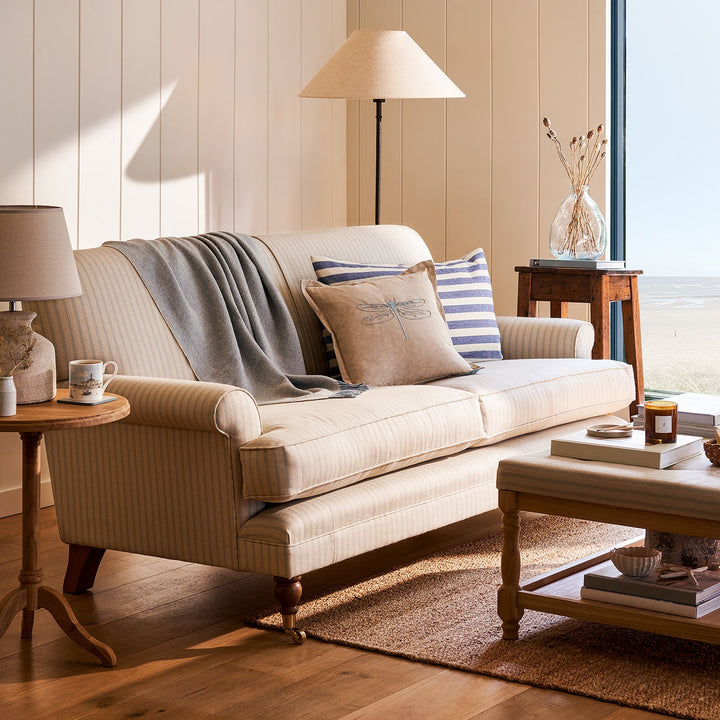 Cream pinstripe 2.5 seater sofa by Sophie Allport