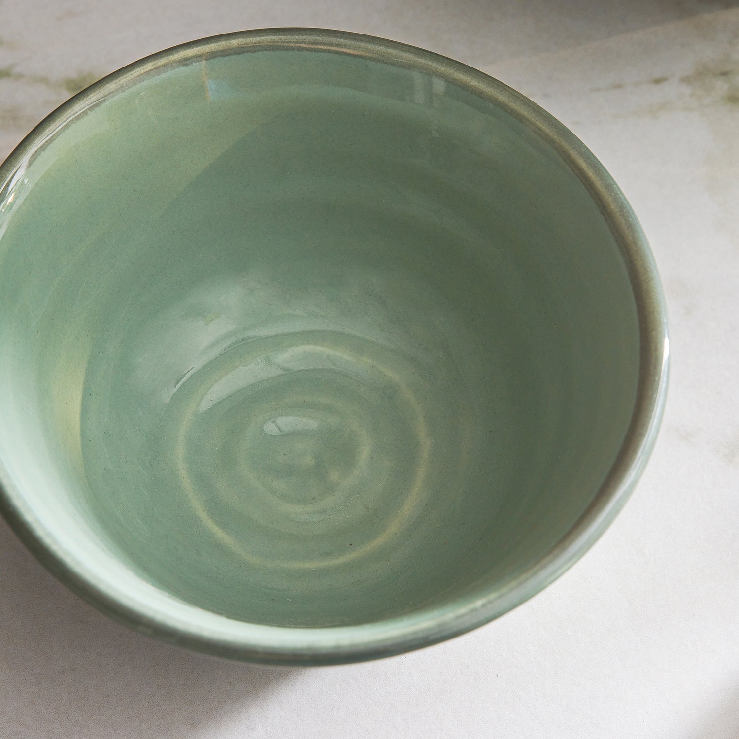 Green stoneware bowls by Sophie Allport detail