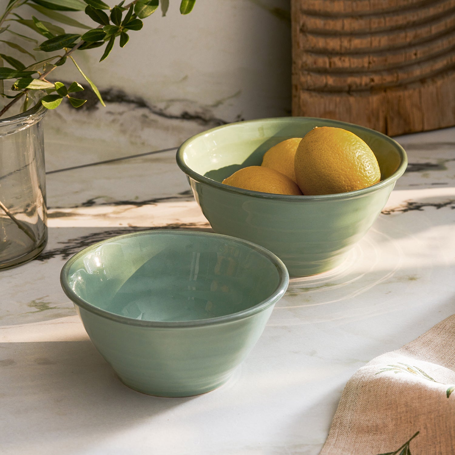Green stoneware bowls by Sophie Allport