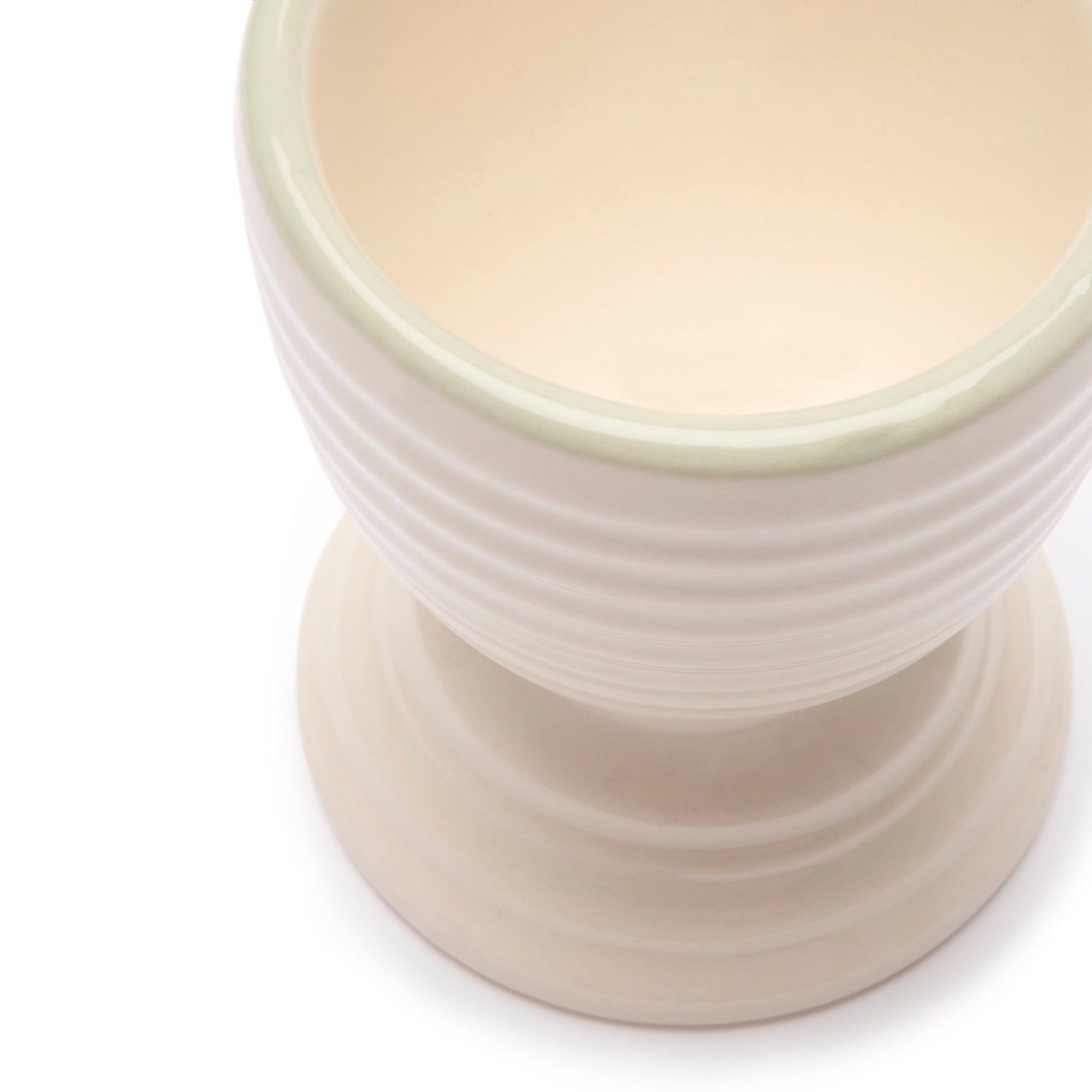Set of 4 white stoneware egg cups by Sophie Allport green rim detail