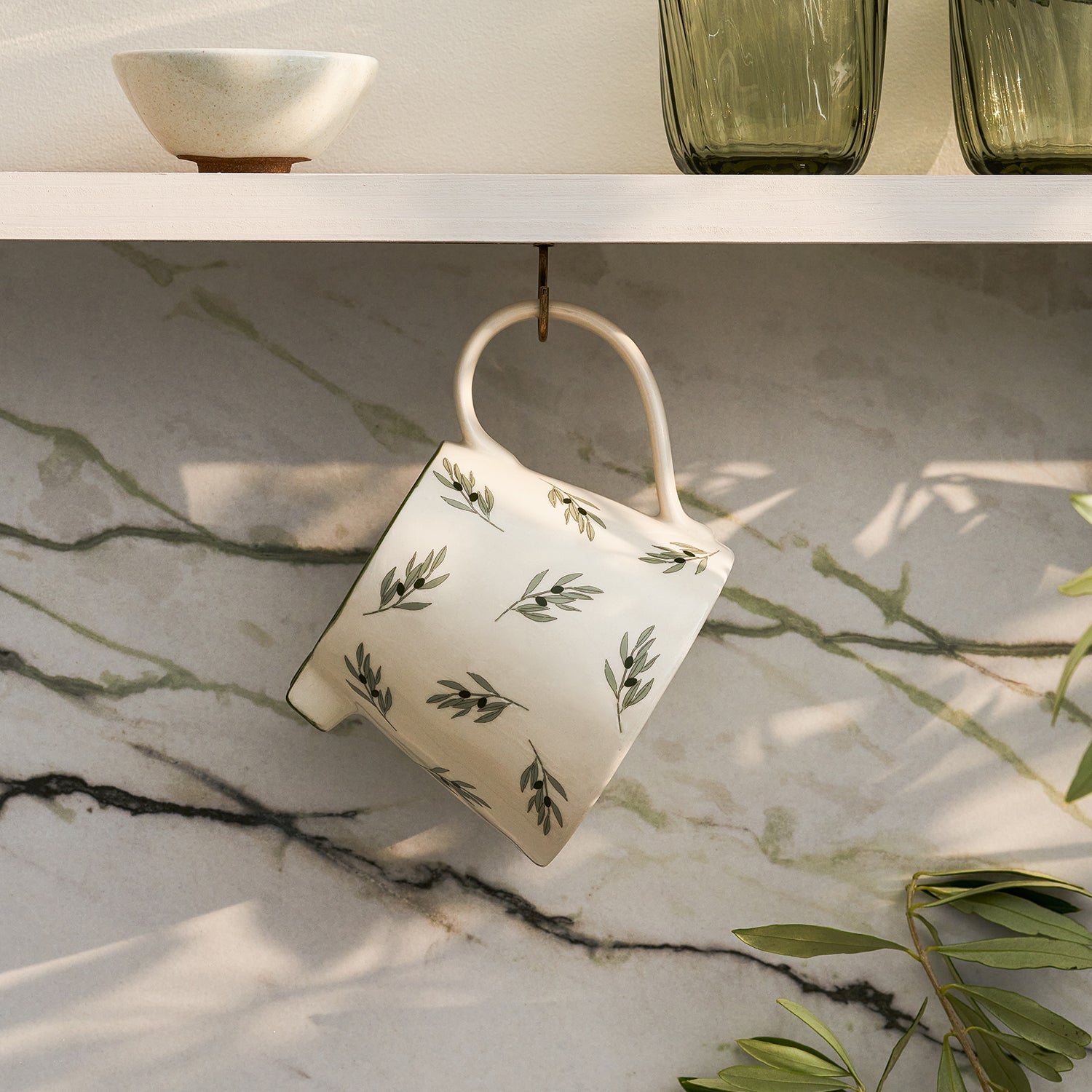 Stoneware jug with olive print by Sophie Allport