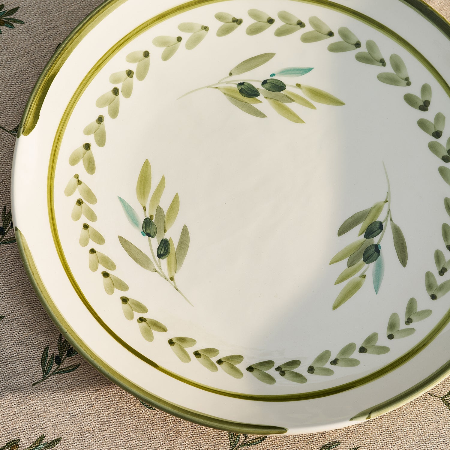 Large stoneware serving platter with olive print by Sophie Allport detail