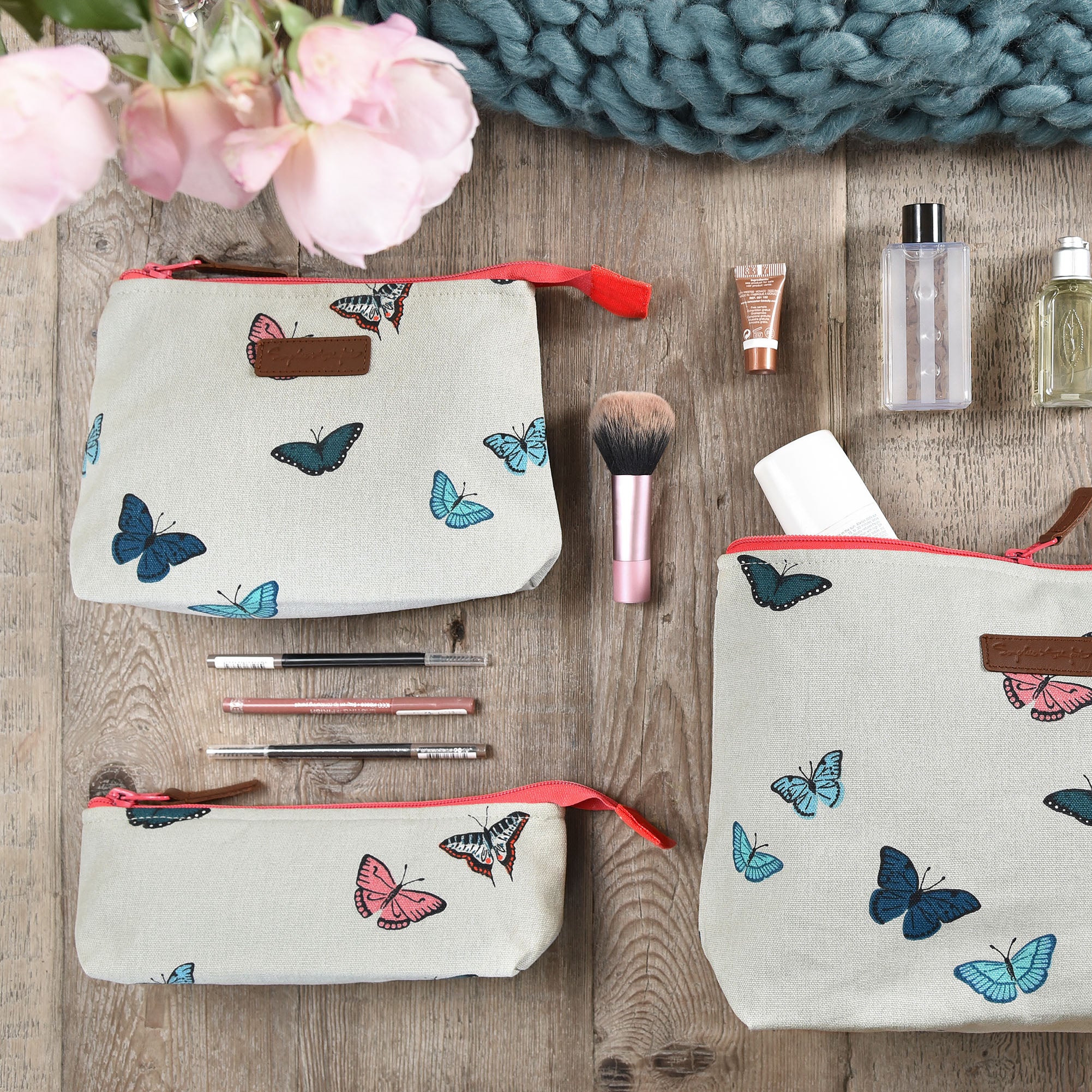 Makeup bag by Sophie Allport covered in colourful butterflies