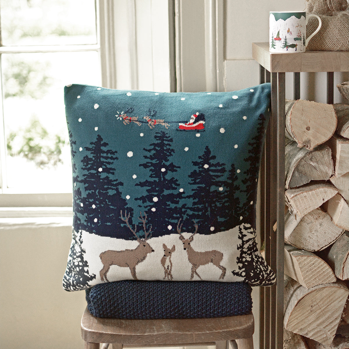 Home for Christmas Knitted Cushion by Sophie Allport