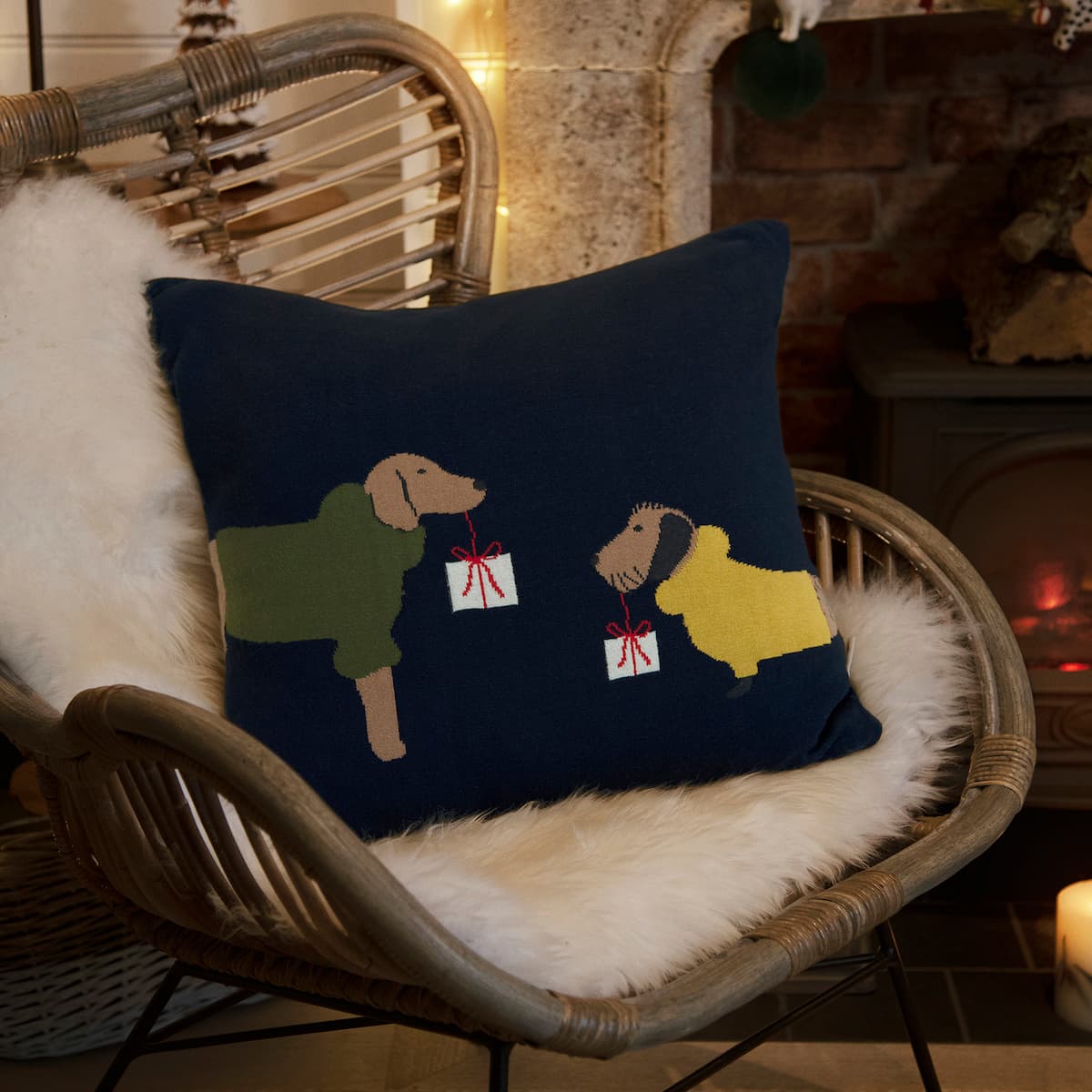 Christmas dogs knitted cushion